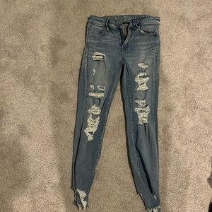 Ripped denim jeans size 4.
